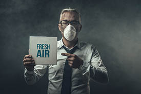 Man pointing out the need for improved air quality