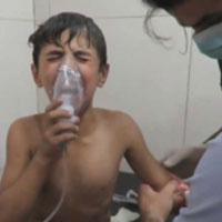 Child being trated after a chloring gas attack