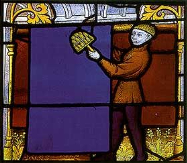 Cloth worker using a teasel frame to card cloth, 15th century stained-glass window, Notre Dame de Semur-en-Auxois, France.