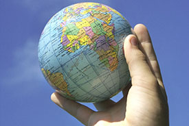 hand and globe