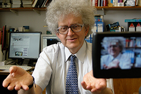 Sir Martyn Poliakoff recording one of his famous YouTube videos.
