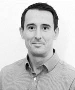 Black and white headshot of Allan Watson