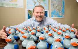 man with a million rubber ducks
