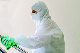 Person cleaning stairs