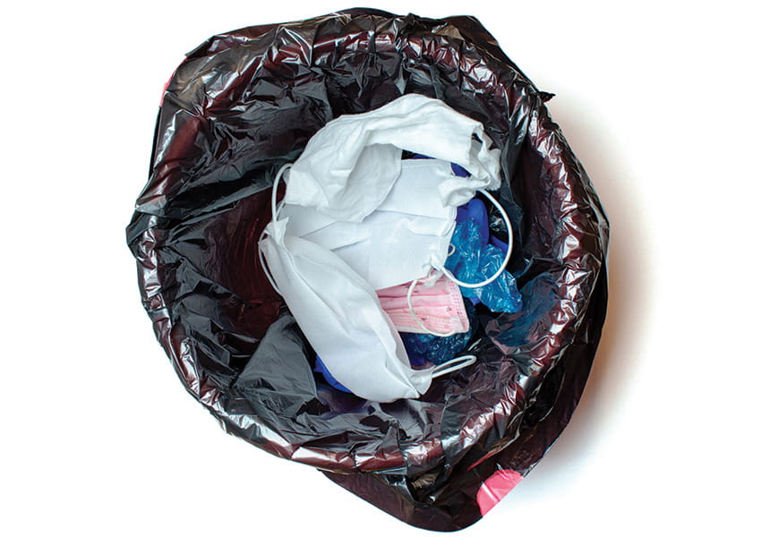 C&I magazine - issue 6 2021 - image of a bin containing PPE - bodytext image