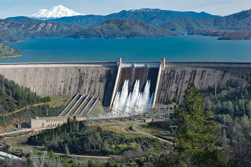 Dam blue sky mountains