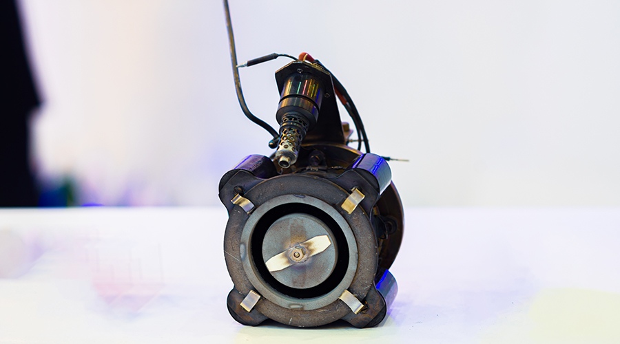 Stationary plasma engine. The operation of the engine is based on the acceleration of the xenon ion flow by the electric field.