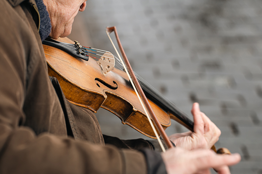 Old man playing the violin