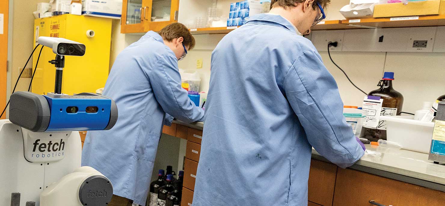 Letting robots into the lab could speed up science. Here's how