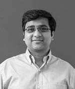 Amit Choudhary headshot, black and white