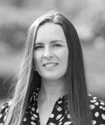 Black and white headshot of Cara Griffiths