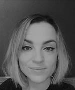 Black and white headshot of speaker, Emily Draper