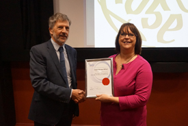 Dr Alan Baylis presents Helen Bonser-Wilton with her certificate