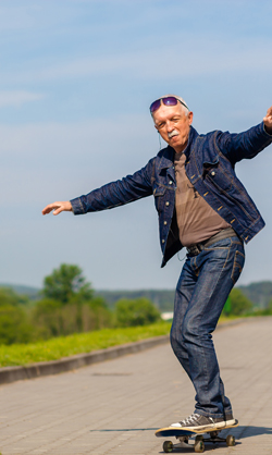 Old man on a skateboard