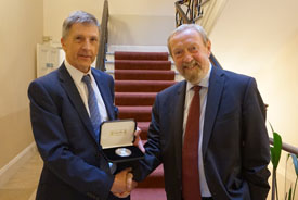 Sir John Beddington is presented with the Sydney Andrew Medal