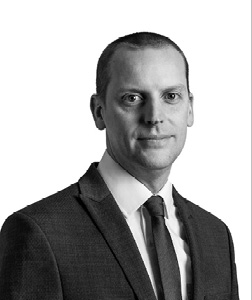 Sam Whitmarsh black and white headshot