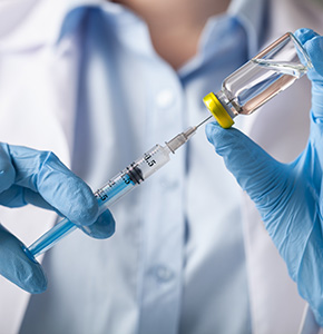 /-/media/images/news/2020/6/landing/handholdingvaccineandsyringe290x300.ashx?h=300&w=290&hash=253CACC0C51364E269A9BACE5330169F87245E95