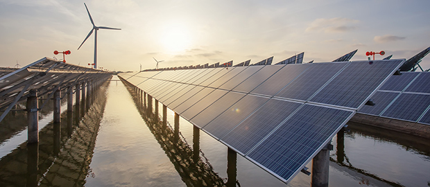 PoliSCI newsletter - 19 October 2021 - Clean energy ambitions - image of solar panels and a wind turbine
