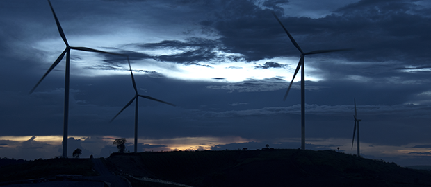 PoliSCI 9 February 2021 - image of a turbine wind farm in the dusk