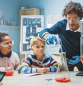 /-/media/images/news/2021/7/chemistryteacherwithchildrenpracticalexperimentslanding.ashx?h=300&w=290&hash=A8D90B7F06E9E21513A65778DCC74DA7