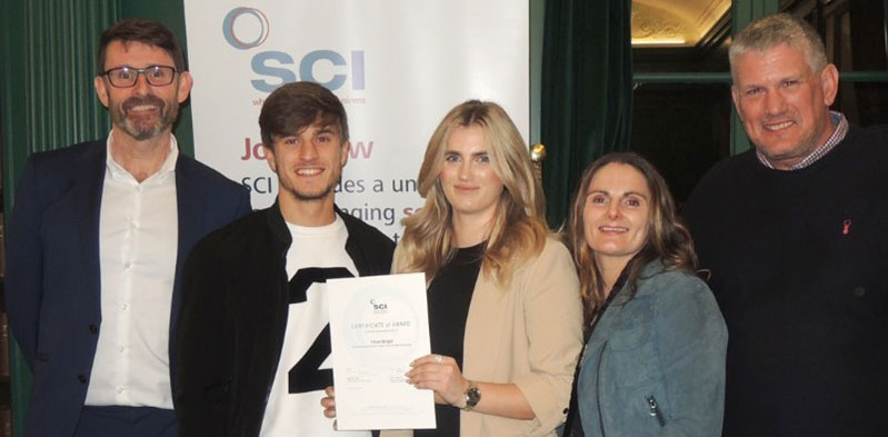 Chloe Wright with her family and Prof Sweeney receiving the Open University prize at the Liverpool & NW Prizes