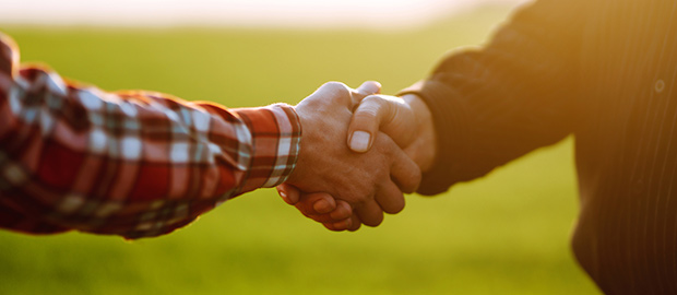 PoliSCI - 03 February 2022 - image of two farmers shaking hands