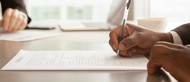 PoliSCI - 03 February 2022 - image of male hands signing papers