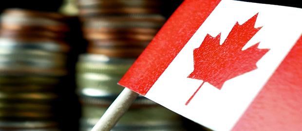 PoliSCI - 12 April 2022 - Canadian flag in front of coins