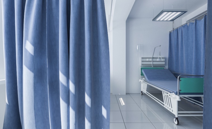 SCI News - 15 September 2022 - image of hospital curtains and bed