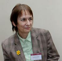 Prof Monique Symonds
