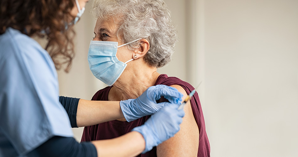SCIblog 19 January 2021 - image of and elderly woman receiving a vaccine