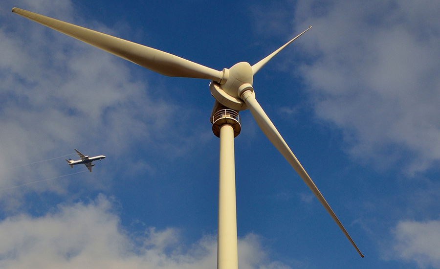 SCIblog - 11 January 2022 - H2go – Johnson Matthey and EU lead hydrogen fuel initiatives - image of a wind turbine and a plane in the background