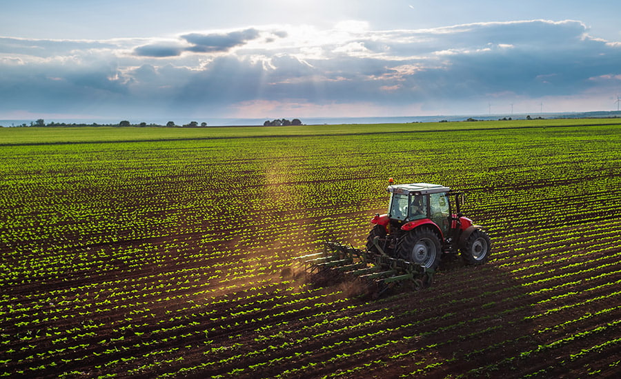 SCIblog - 05 May 2022 - image of a tractor working the field