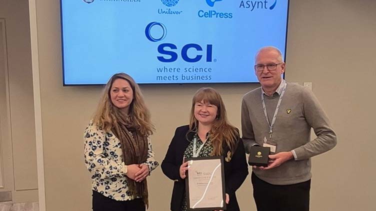 Dr Richard Greenwood and Dr Shirin Alexander present the McBain Medal to Dr Gemma-Louise Davies